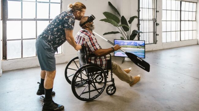 Men using virtual reality for rehabilitation indoors, fostering inclusivity and innovative therapy. - Photo by RDNE Stock project on Pexels
